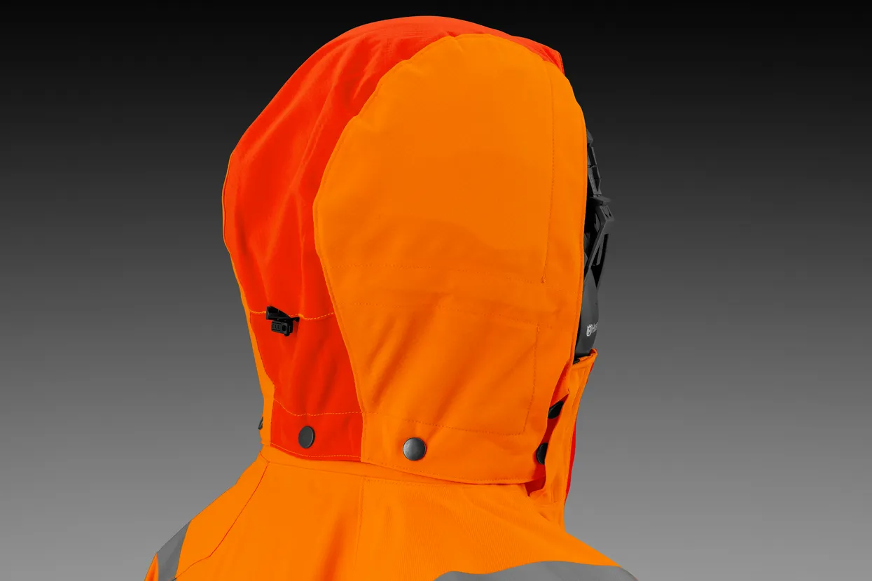 Detachable and helmet-compatible hood